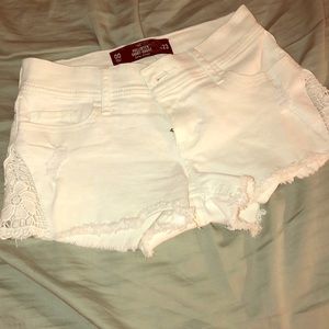 White denim lace shorts